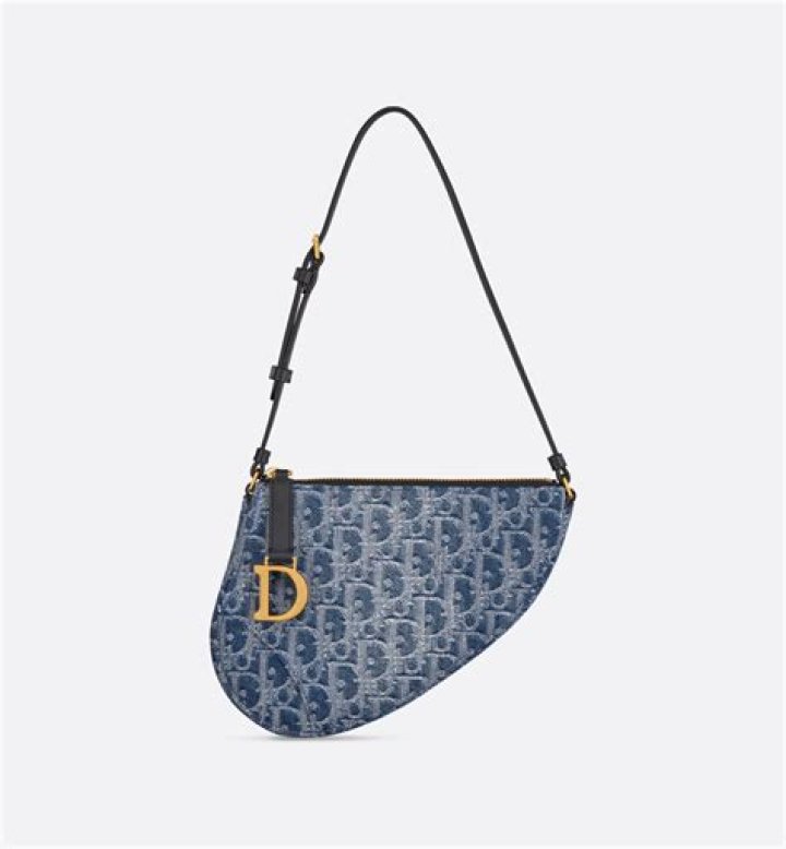 pre-loved Dior Saddle Pochette denim bag